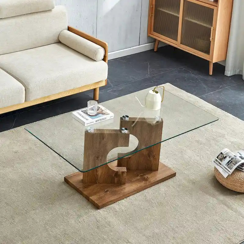 Un tavolino da caffè rettangolare moderno e alla moda con piano in vetro temperato e gambe in MDF bianco